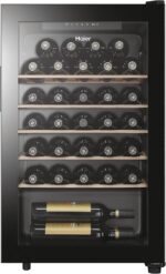 Haier HWS33GG Weinkühlschrank / 33 Flaschen / 83 cm Höhe / 1 Zone/UV undurchlässige Glastür / 5 Holzablagen/LED Beleuchtsystem/Vibrationsarmer Kompressor/hOn App, Schwarz